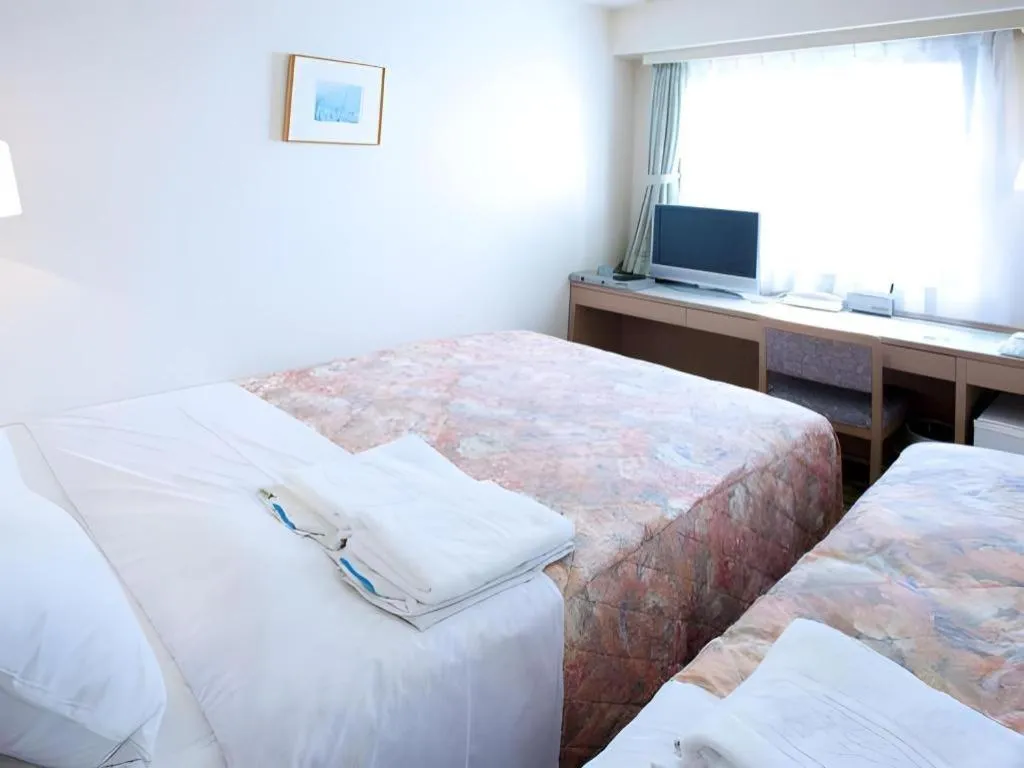 Bed in Hotel IL FIORE Kasai ANNEX