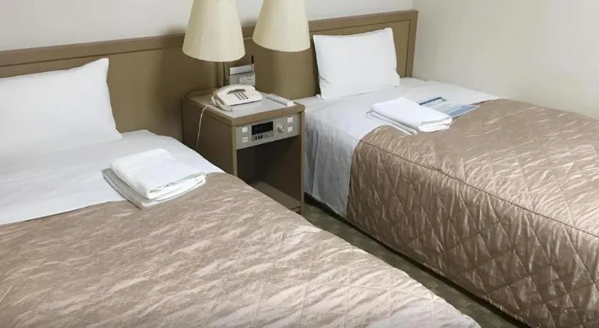 Bed in Hotel IL FIORE Kasai ANNEX