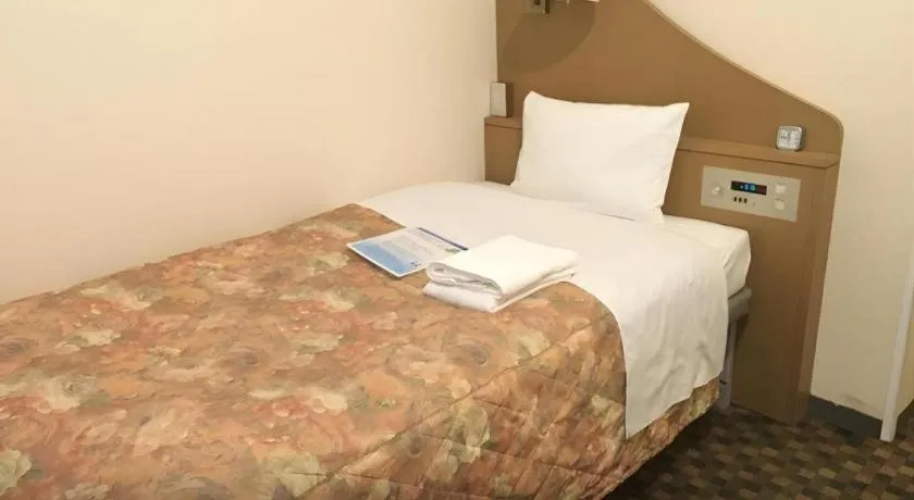 Bed in Hotel IL FIORE Kasai ANNEX