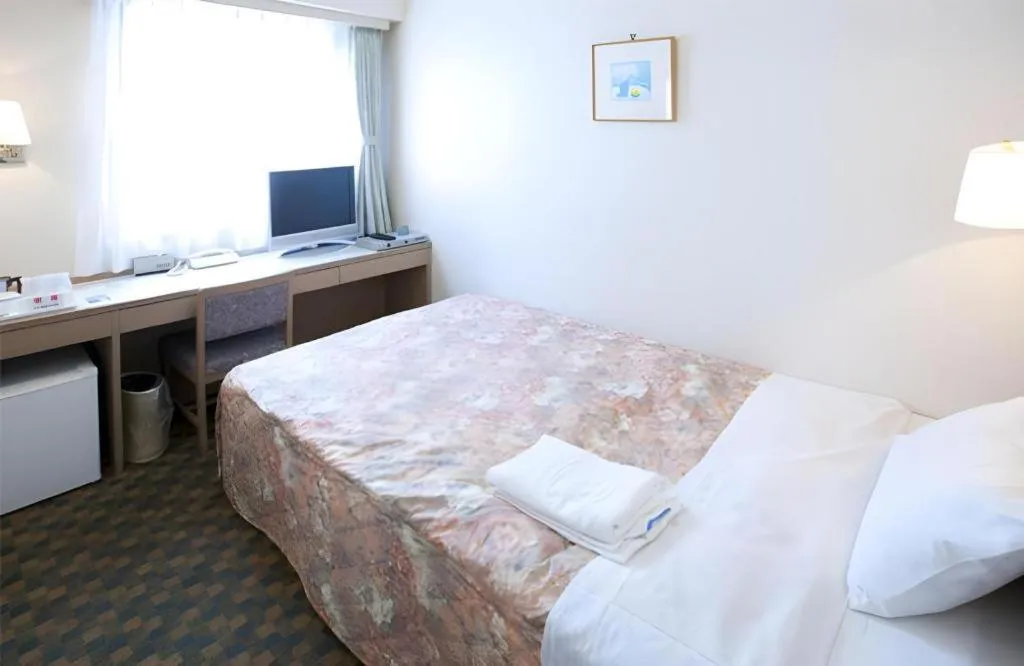 Bed in Hotel IL FIORE Kasai ANNEX