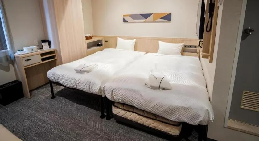 Bed in Hotel IL FIORE Kasai ANNEX