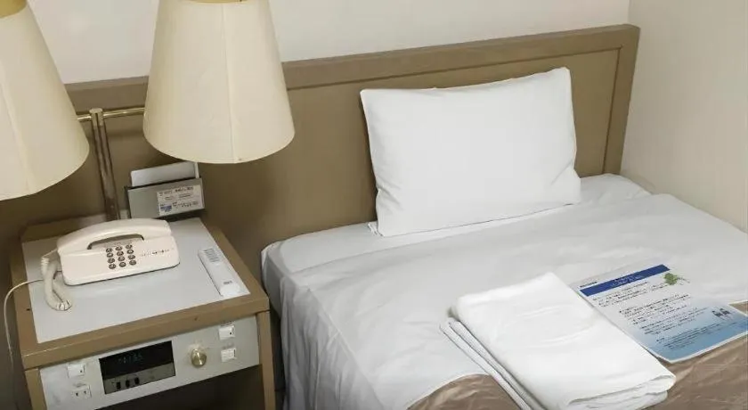 Bed in Hotel IL FIORE Kasai ANNEX