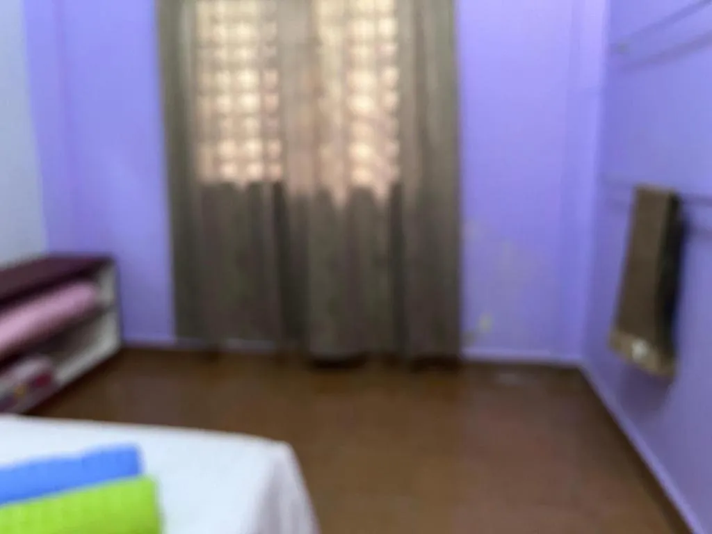 Bed in OYO 90967 Homestay Chalet Warisan Siti