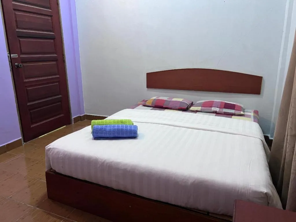 Bed in OYO 90967 Homestay Chalet Warisan Siti