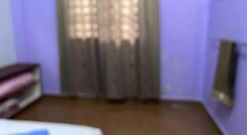 Bed in OYO 90967 Homestay Chalet Warisan Siti