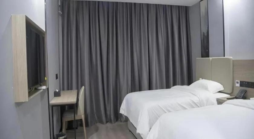 Bed in GreenTree Inn Anqing Tongcheng South Shengtang Road Shengtang International Business Hotel