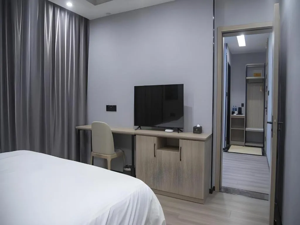 Bed in GreenTree Inn Anqing Tongcheng South Shengtang Road Shengtang International Business Hotel