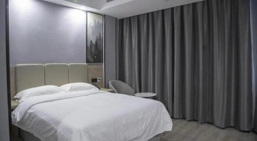 Bed in GreenTree Inn Anqing Tongcheng South Shengtang Road Shengtang International Business Hotel