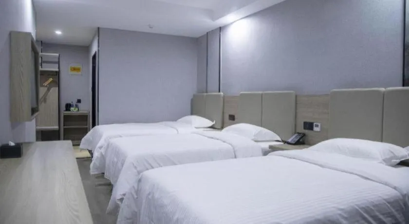 Bed in GreenTree Inn Anqing Tongcheng South Shengtang Road Shengtang International Business Hotel