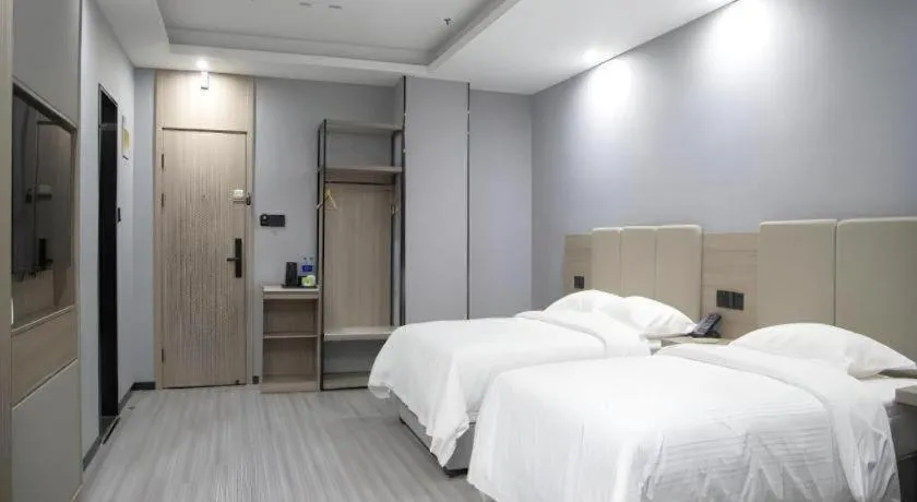Bed in GreenTree Inn Anqing Tongcheng South Shengtang Road Shengtang International Business Hotel