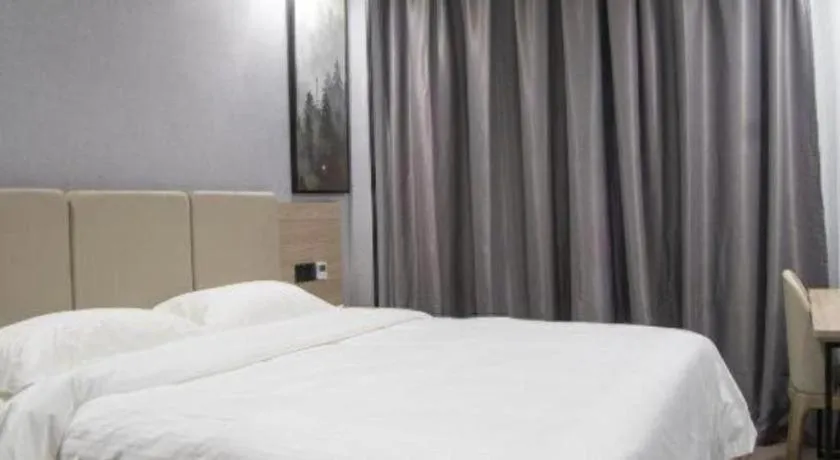 Bed in GreenTree Inn Anqing Tongcheng South Shengtang Road Shengtang International Business Hotel