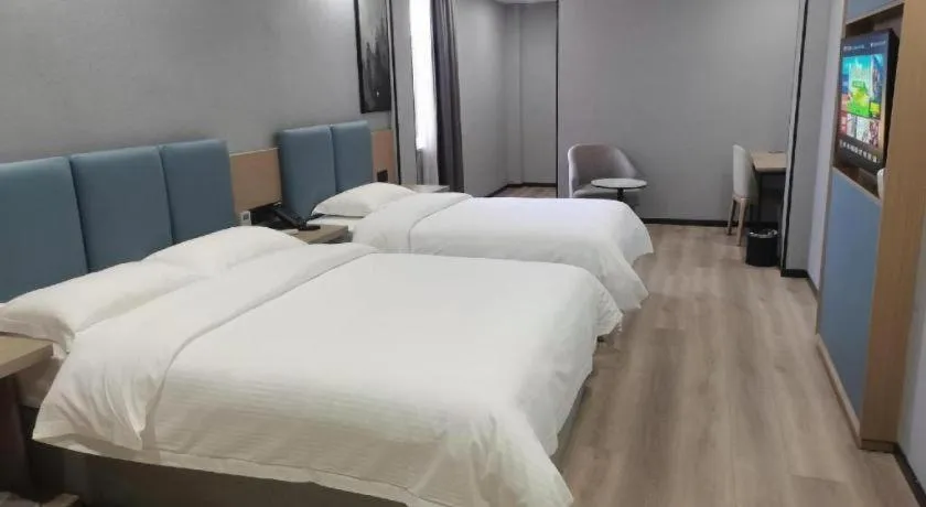 Bed in GreenTree Inn Anqing Tongcheng South Shengtang Road Shengtang International Business Hotel
