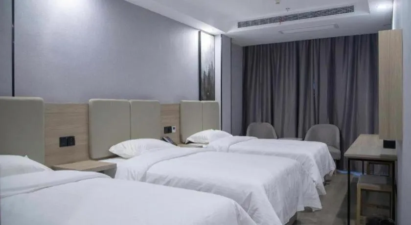 Bed in GreenTree Inn Anqing Tongcheng South Shengtang Road Shengtang International Business Hotel