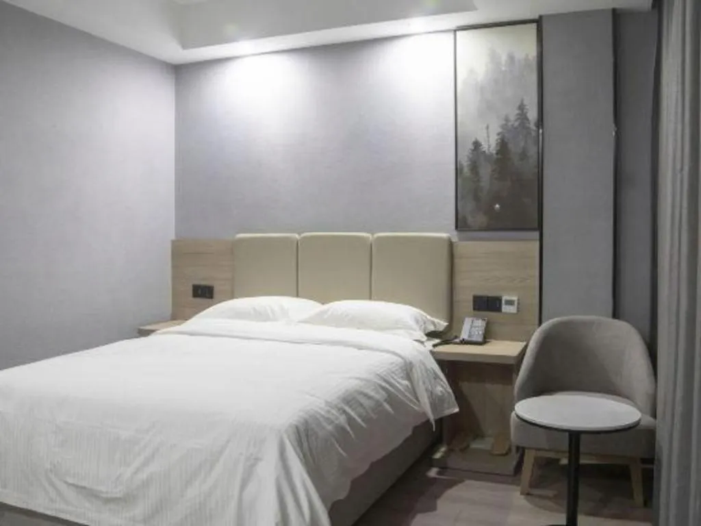 Bed in GreenTree Inn Anqing Tongcheng South Shengtang Road Shengtang International Business Hotel