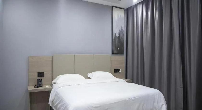 Bed in GreenTree Inn Anqing Tongcheng South Shengtang Road Shengtang International Business Hotel