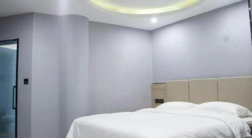 Bed in GreenTree Inn Anqing Tongcheng South Shengtang Road Shengtang International Business Hotel