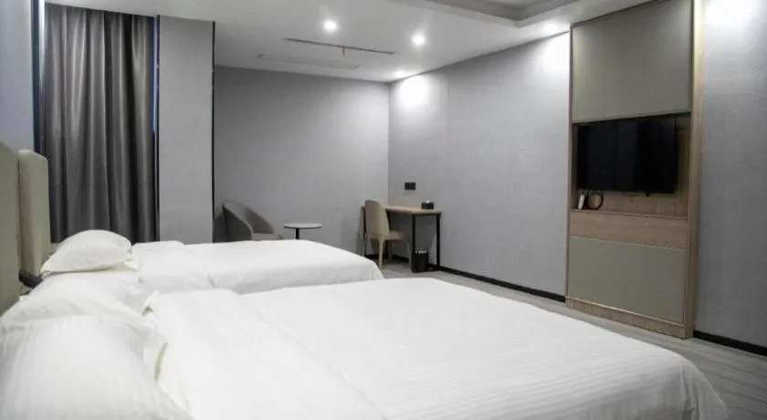 Bed in GreenTree Inn Anqing Tongcheng South Shengtang Road Shengtang International Business Hotel