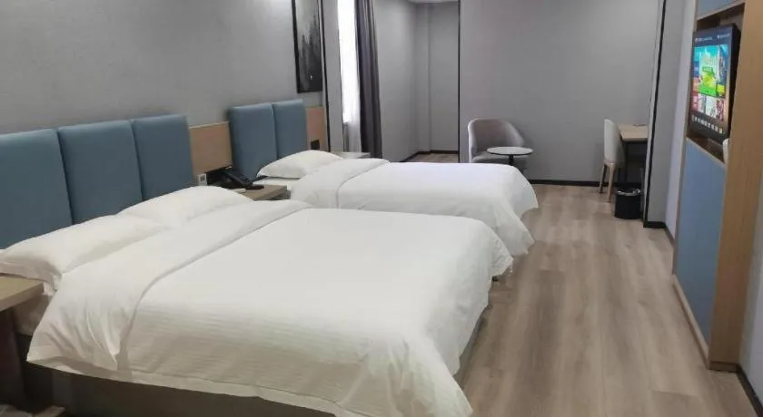 Bed in GreenTree Inn Anqing Tongcheng South Shengtang Road Shengtang International Business Hotel