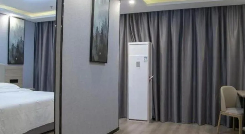 Bed in GreenTree Inn Anqing Tongcheng South Shengtang Road Shengtang International Business Hotel