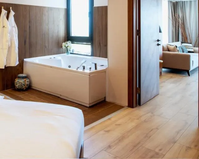 Bed in Maison Vourla Hotel