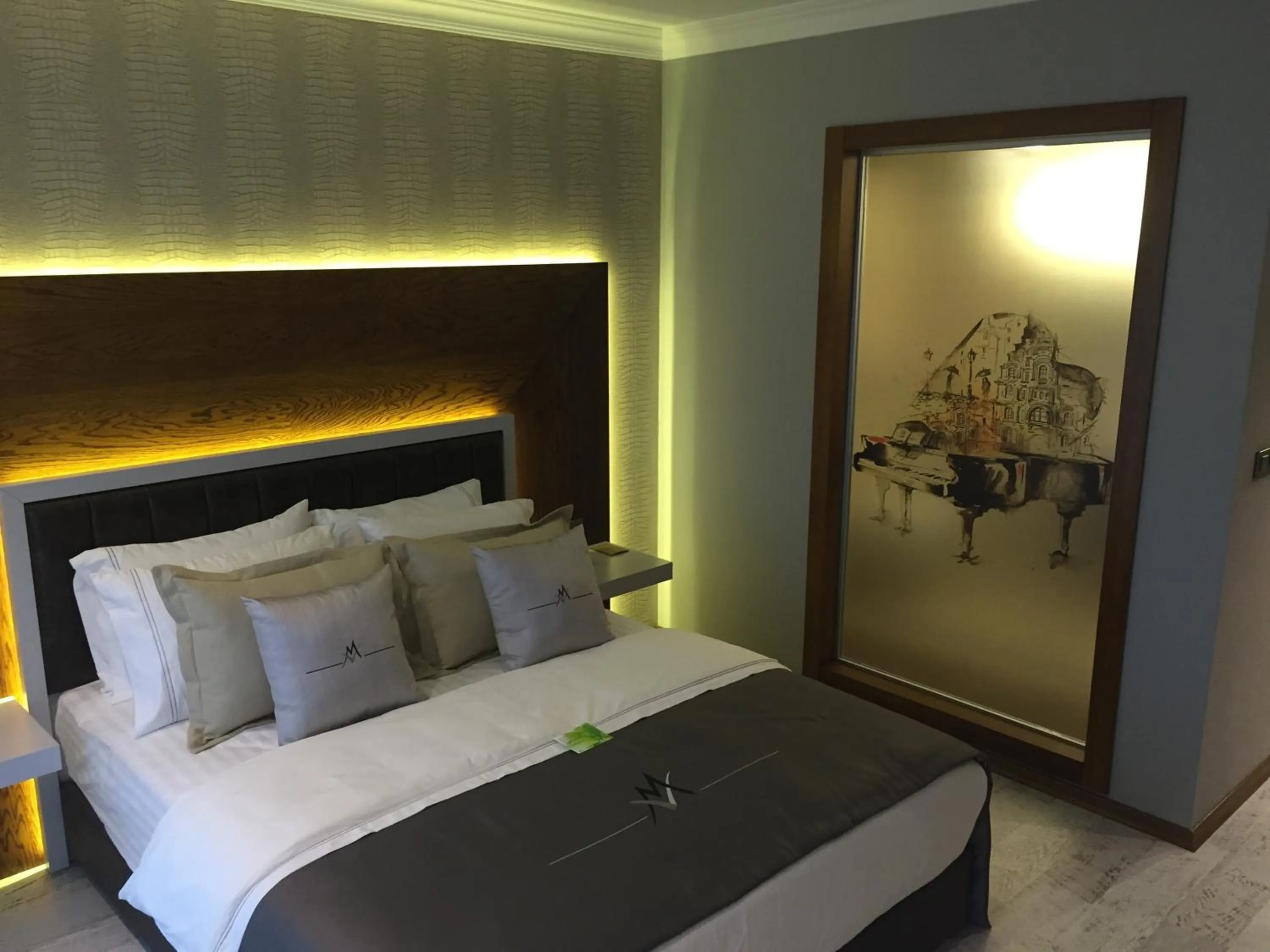 Decorative detail, Bed in Maison Vourla Hotel