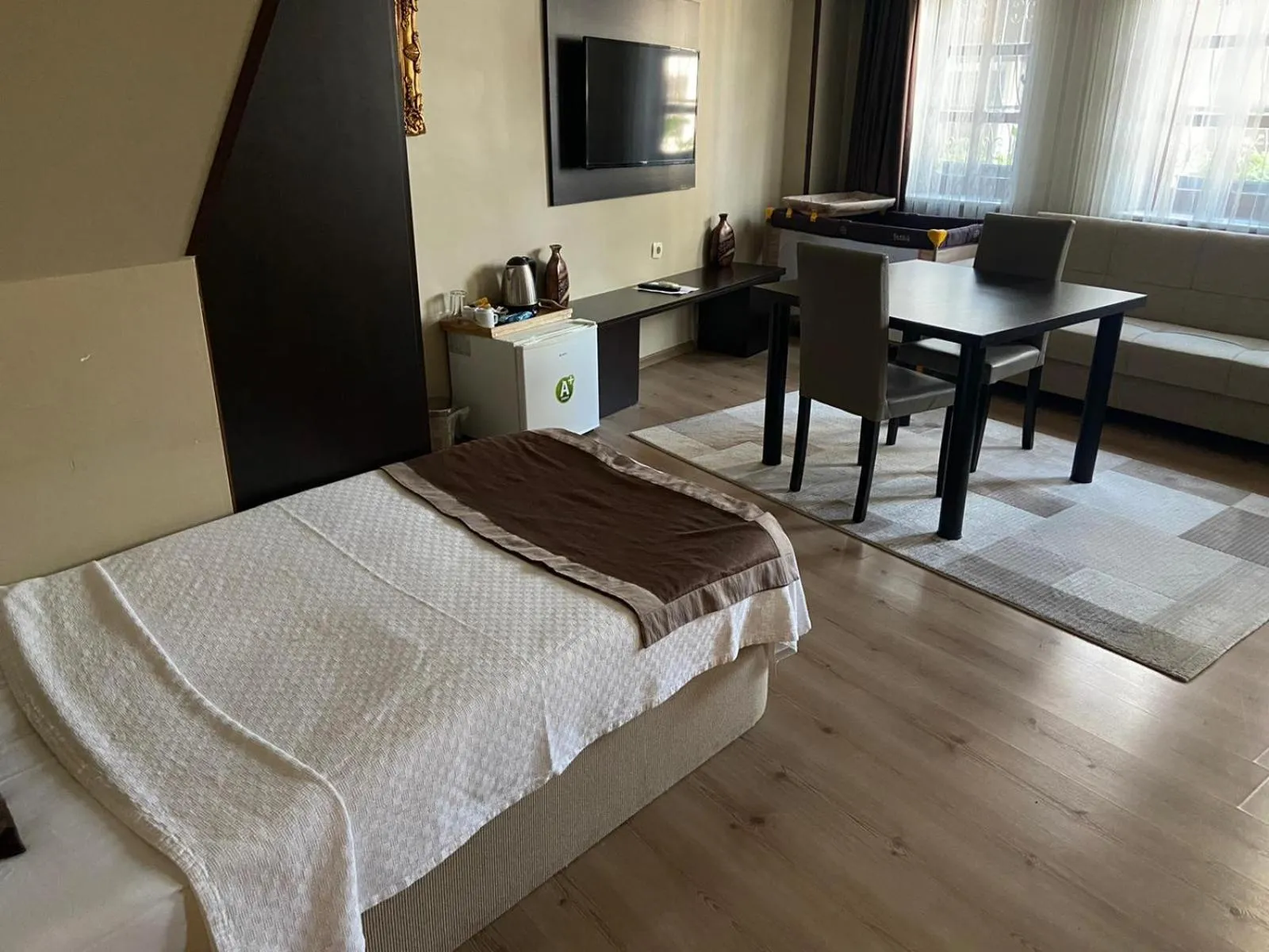 Bed in Lena Central Flats