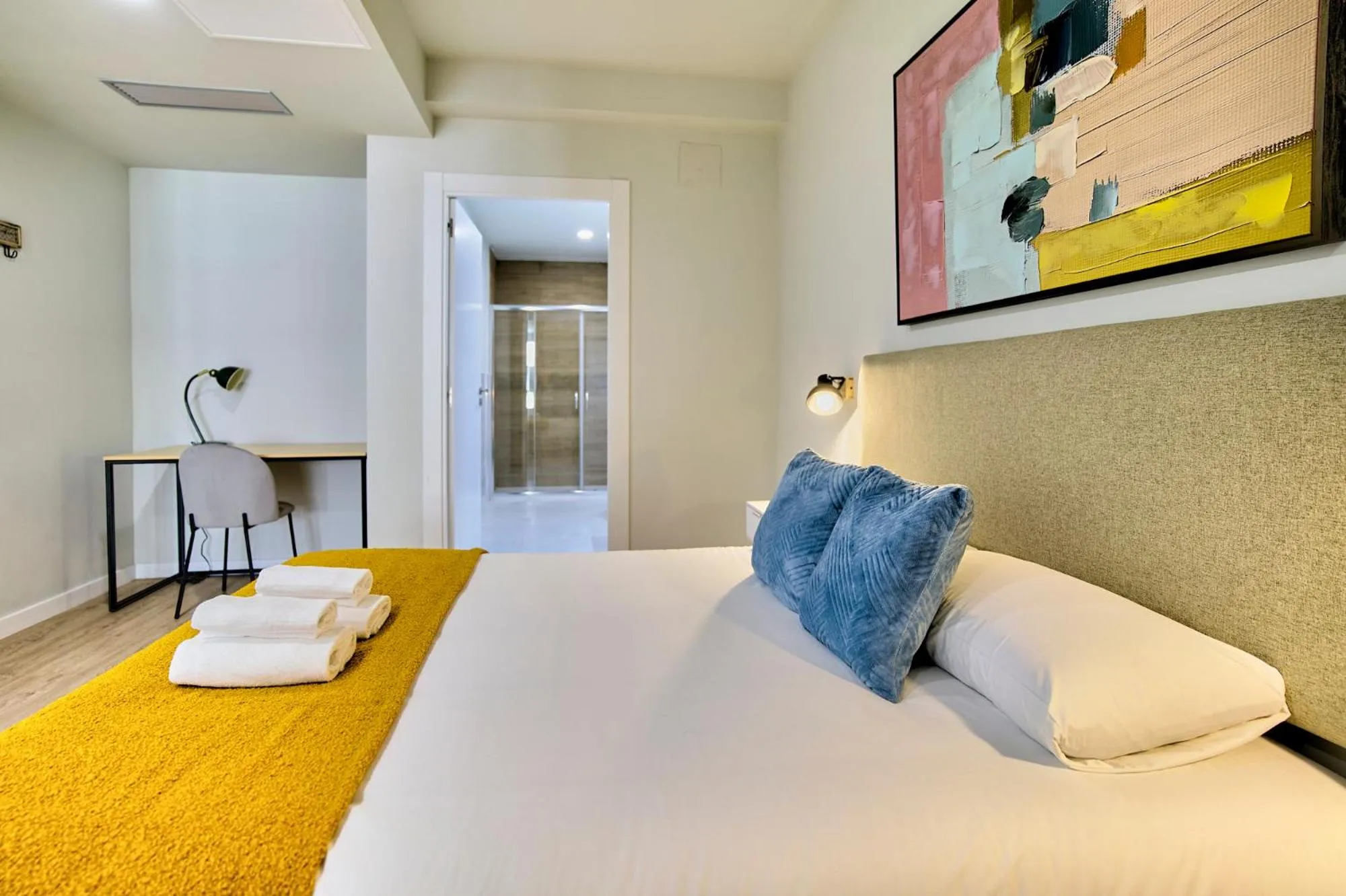 Bed in Apartamentos Olivia by gaiarooms