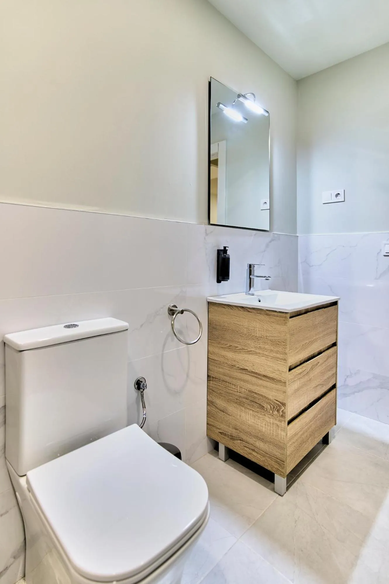 Toilet in Apartamentos Olivia by gaiarooms