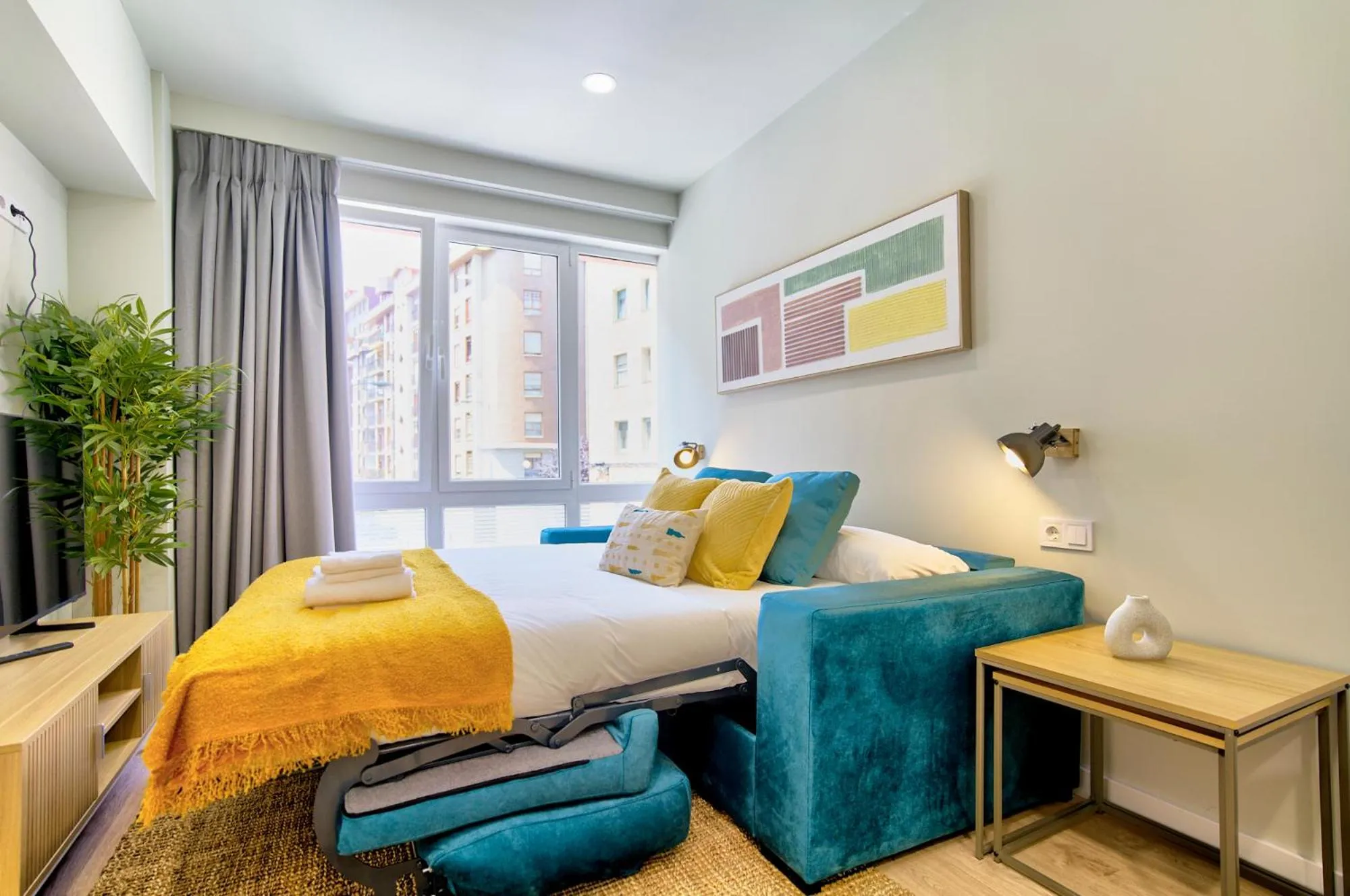 Bed in Apartamentos Olivia by gaiarooms