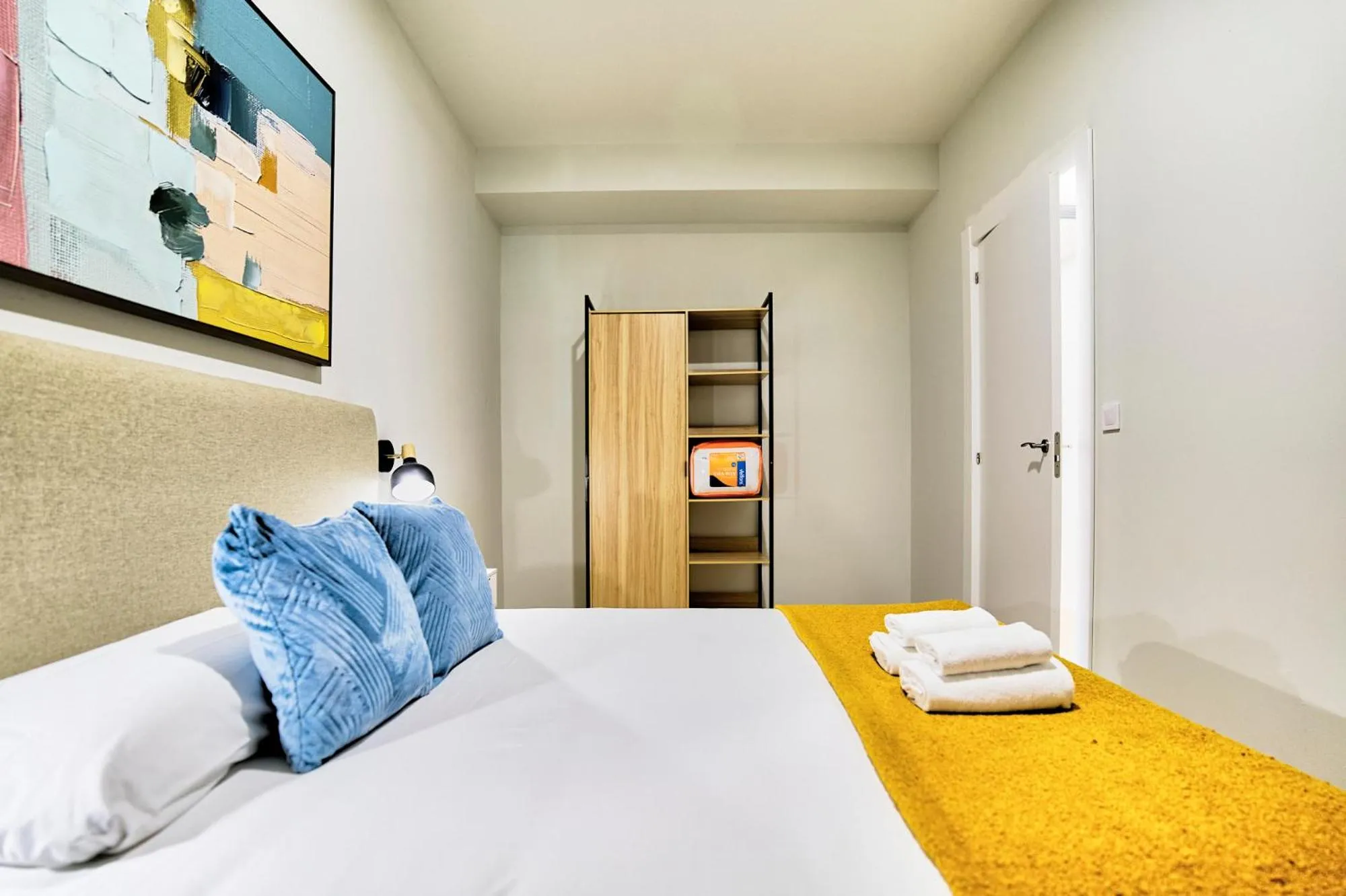 Bed in Apartamentos Olivia by gaiarooms