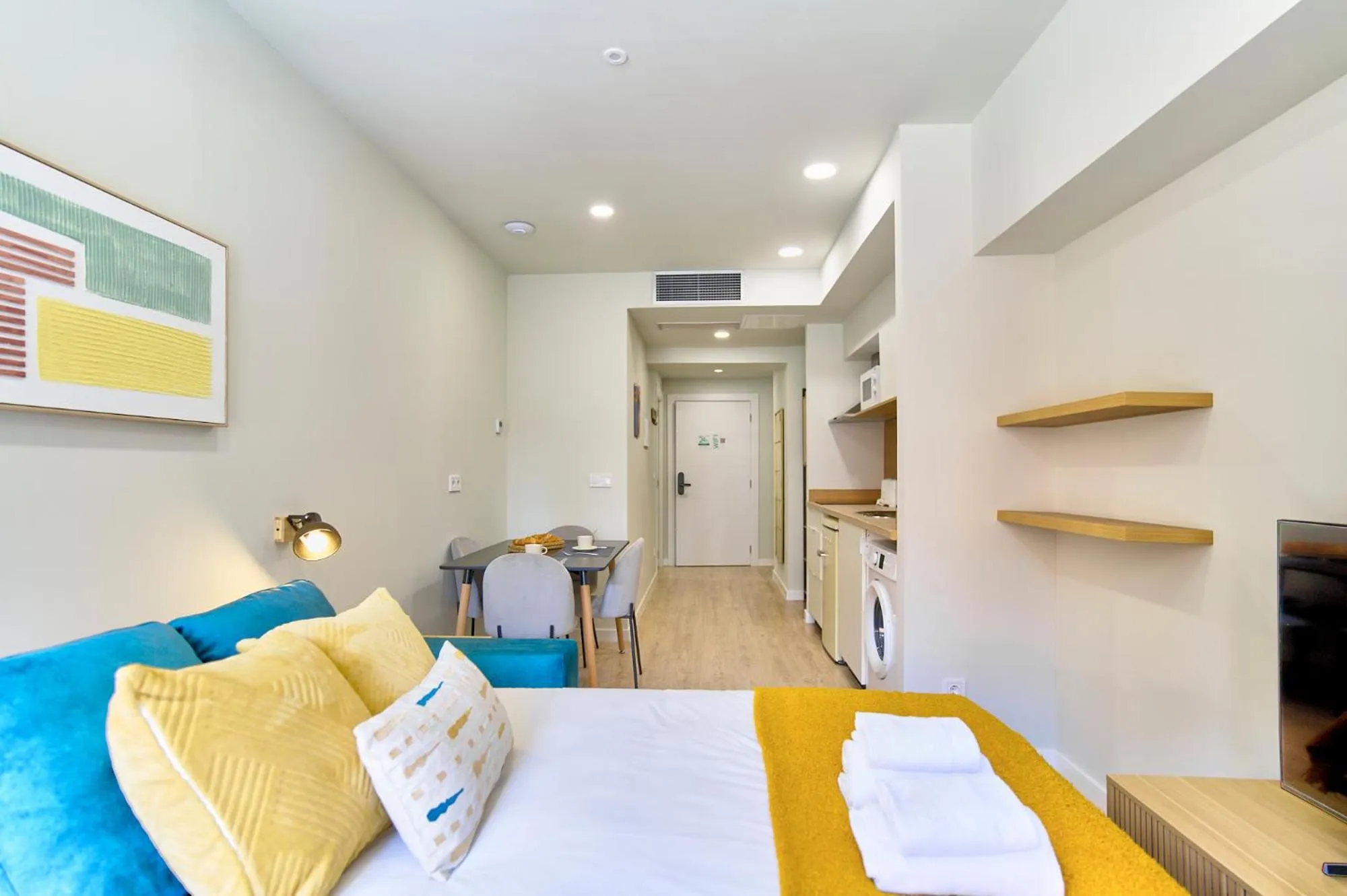 Bed in Apartamentos Olivia by gaiarooms