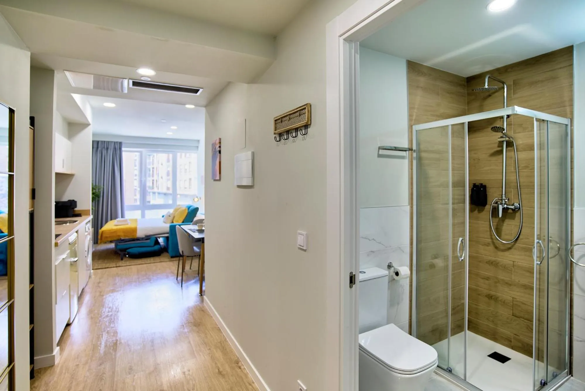 Shower in Apartamentos Olivia by gaiarooms