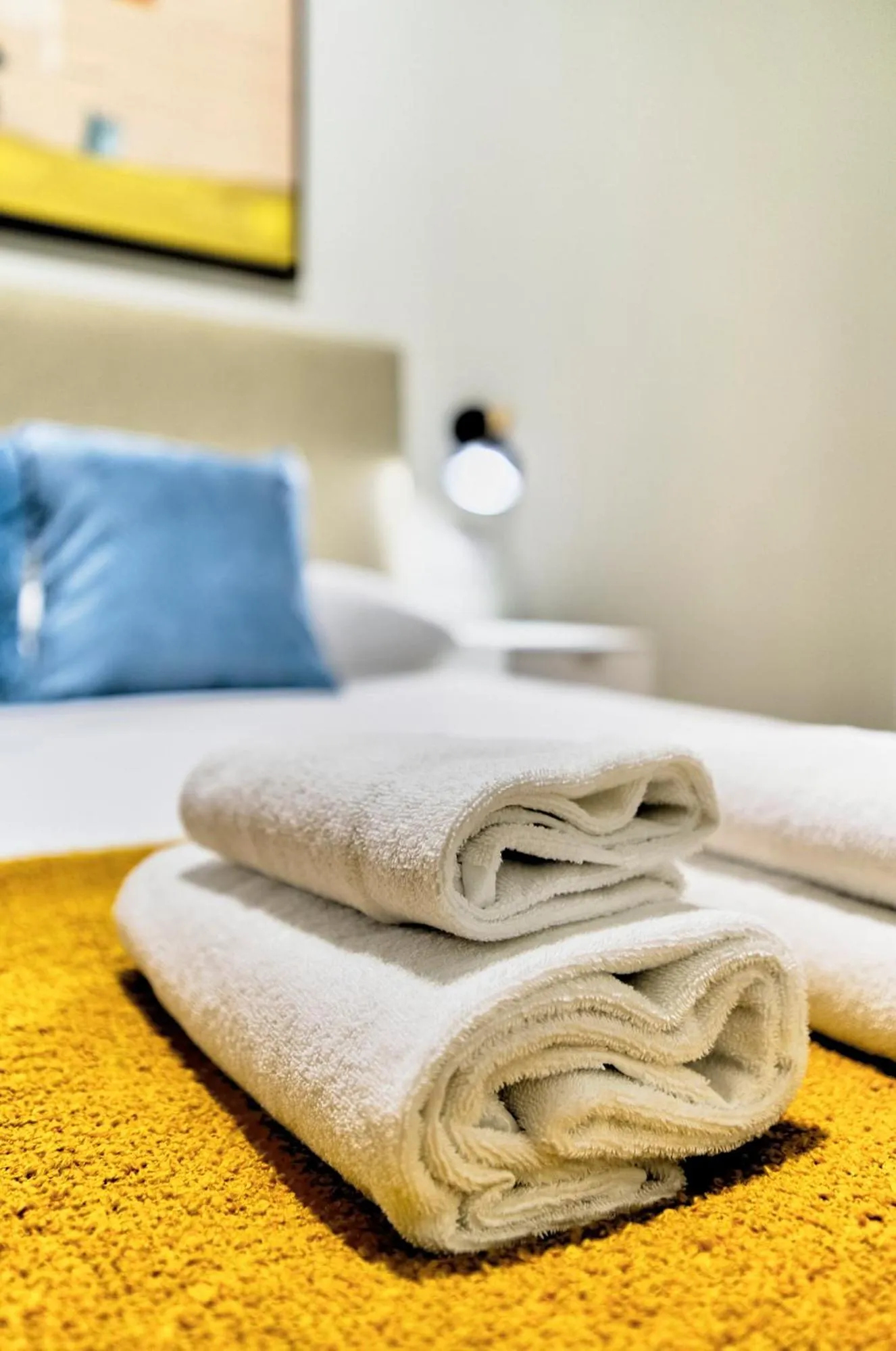 towels, Bed in Apartamentos Olivia by gaiarooms