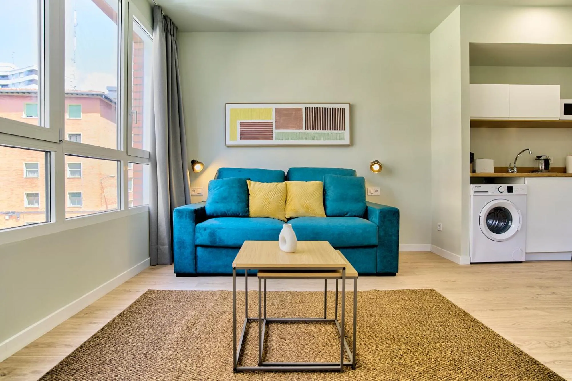 Living room in Apartamentos Olivia by gaiarooms