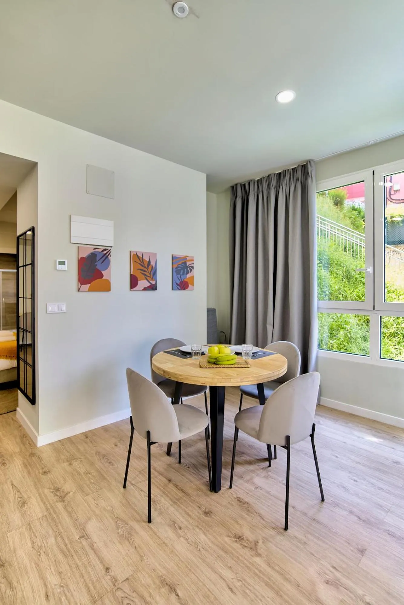 Dining area in Apartamentos Olivia by gaiarooms
