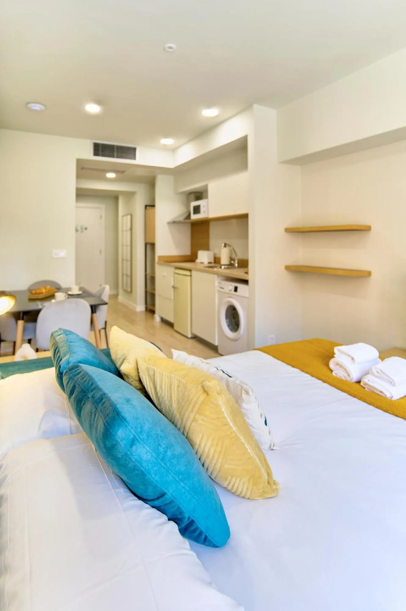 Bed in Apartamentos Olivia by gaiarooms