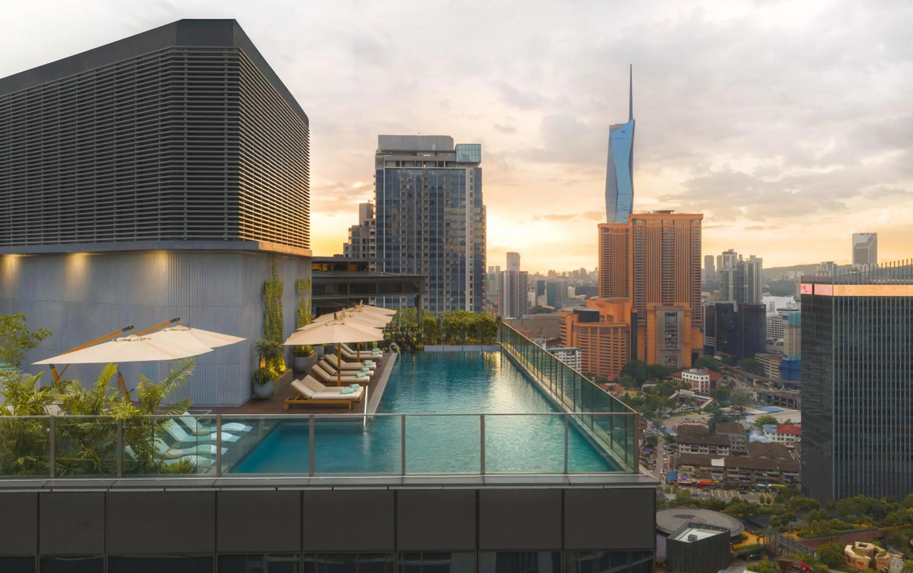 Swimming pool in Kimpton Naluria Kuala Lumpur by IHG