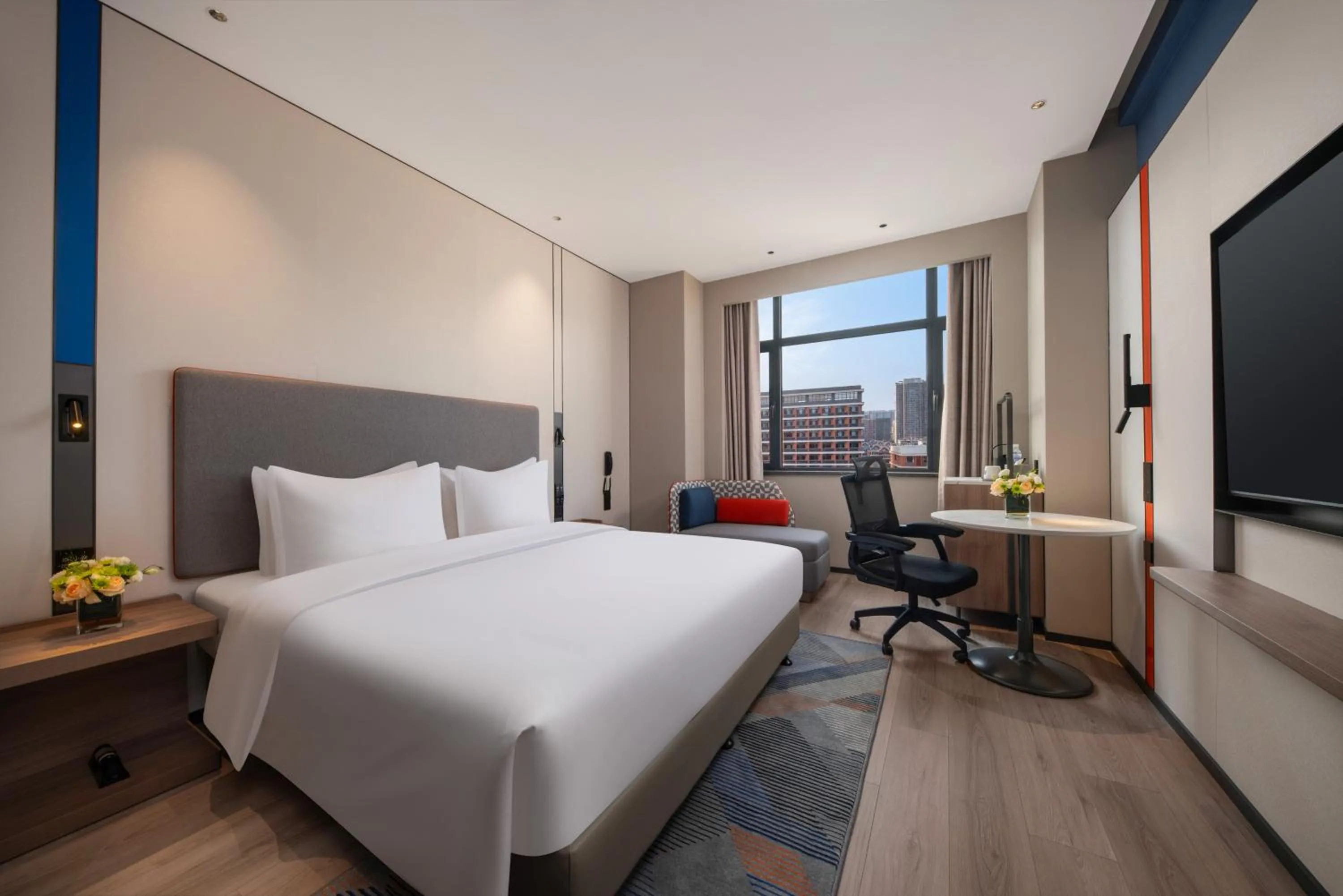 Bed in Holiday Inn Express Qingdao City Balcony by IHG