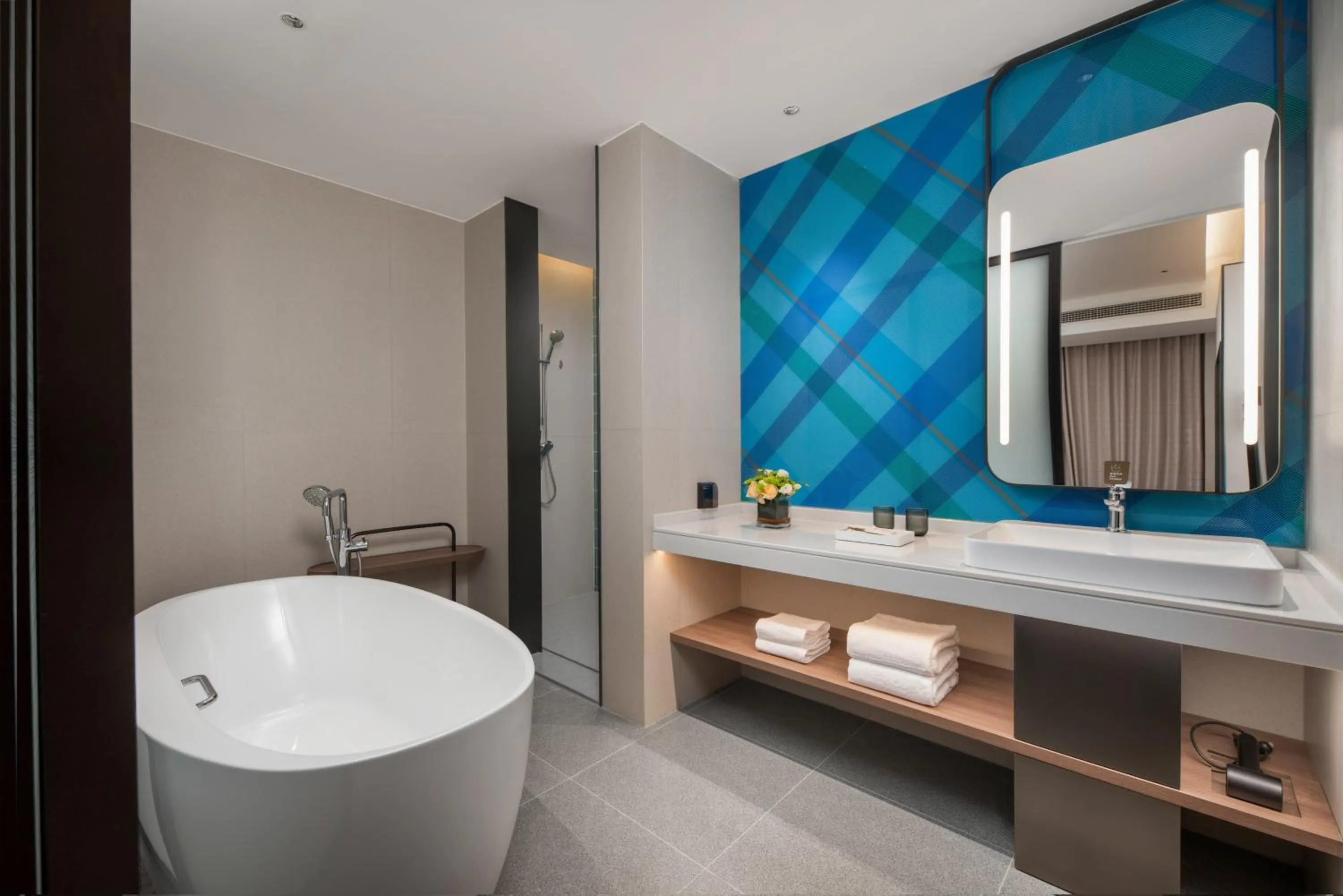 Photo of the whole room in Holiday Inn Express Qingdao City Balcony by IHG