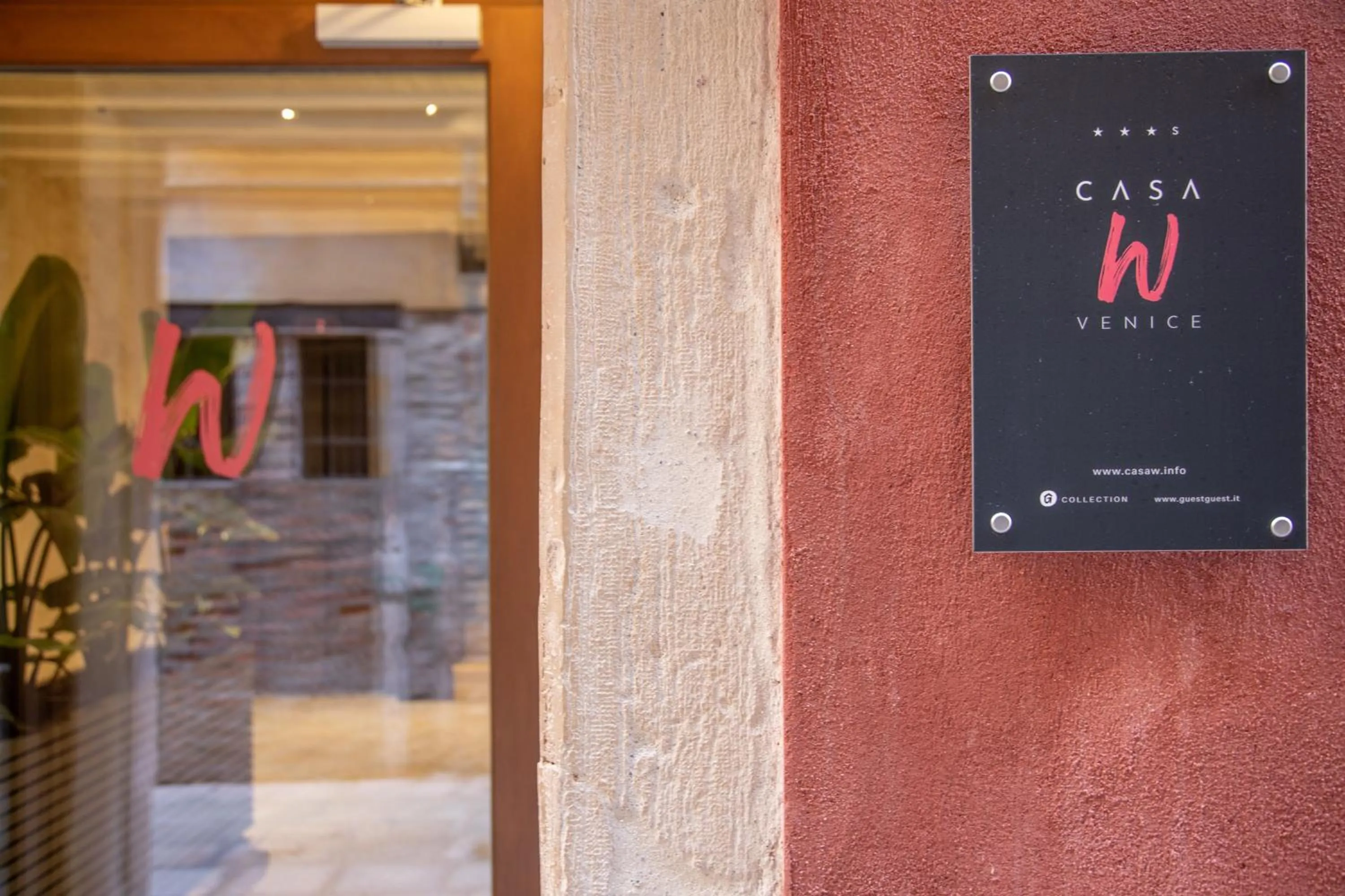 Property logo or sign in Hotel Casa W