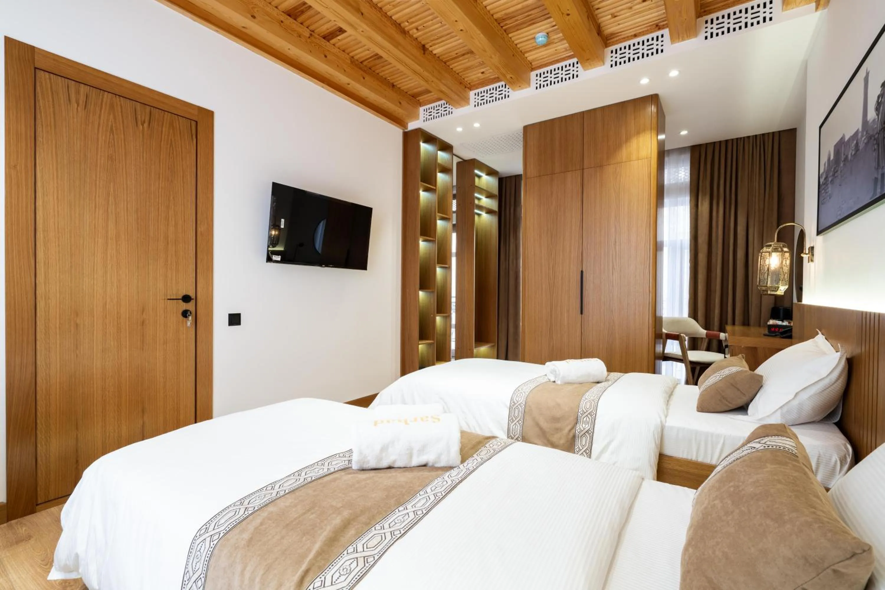 Photo of the whole room, Bed in Sarhad Hotel