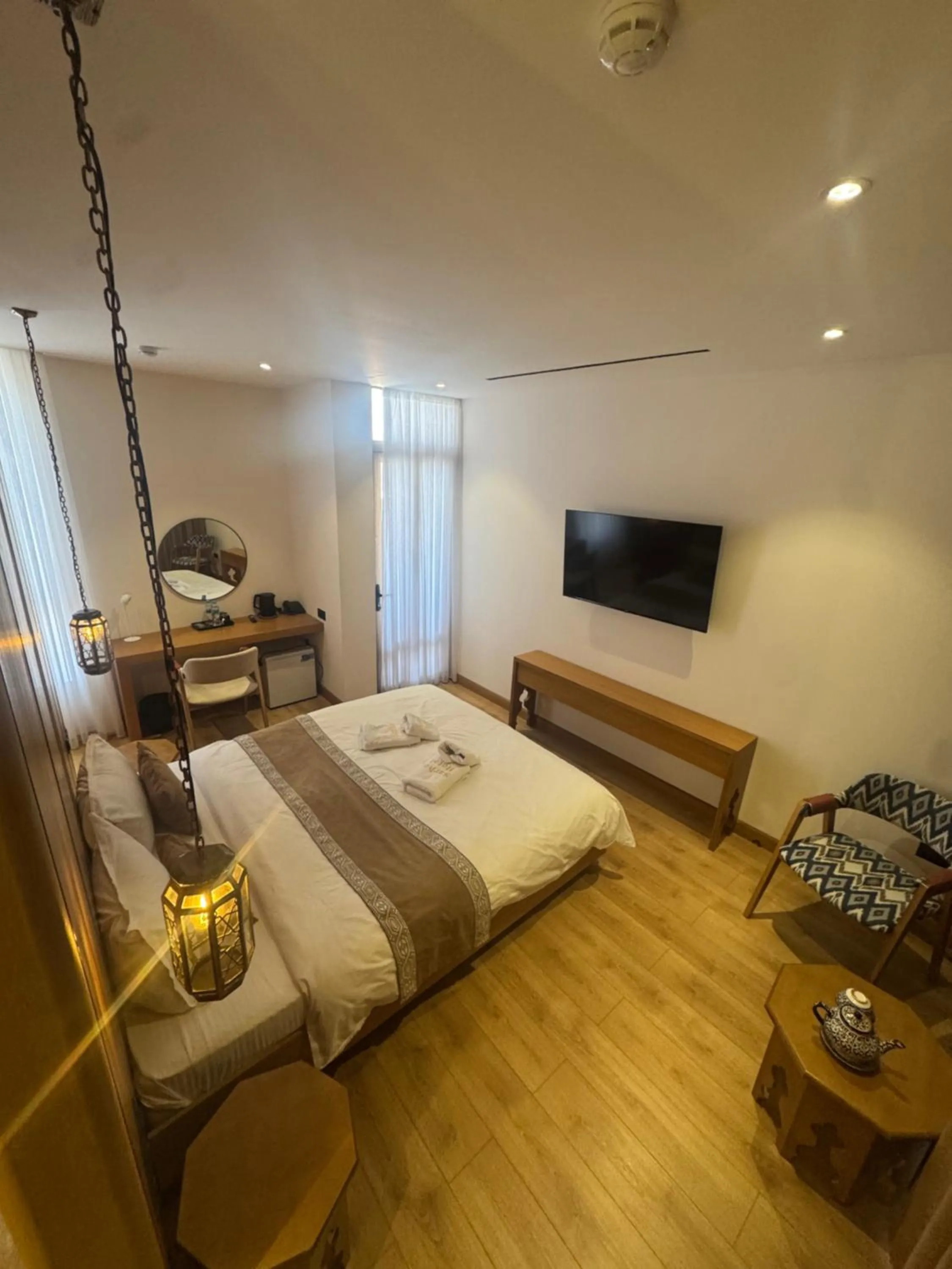 Photo of the whole room, Bed in Sarhad Hotel