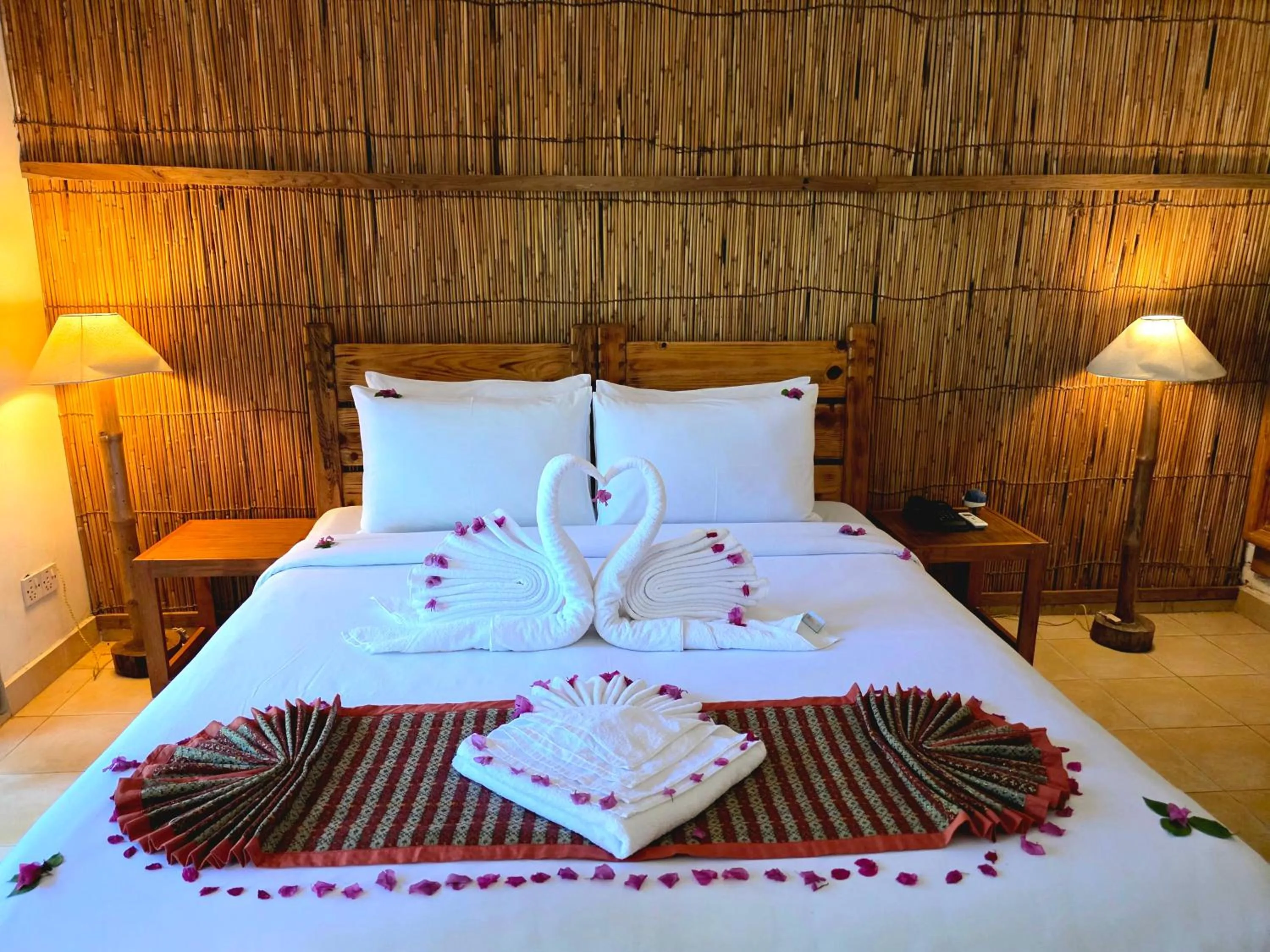 Bed in Siddhartha Wildlife Retreat