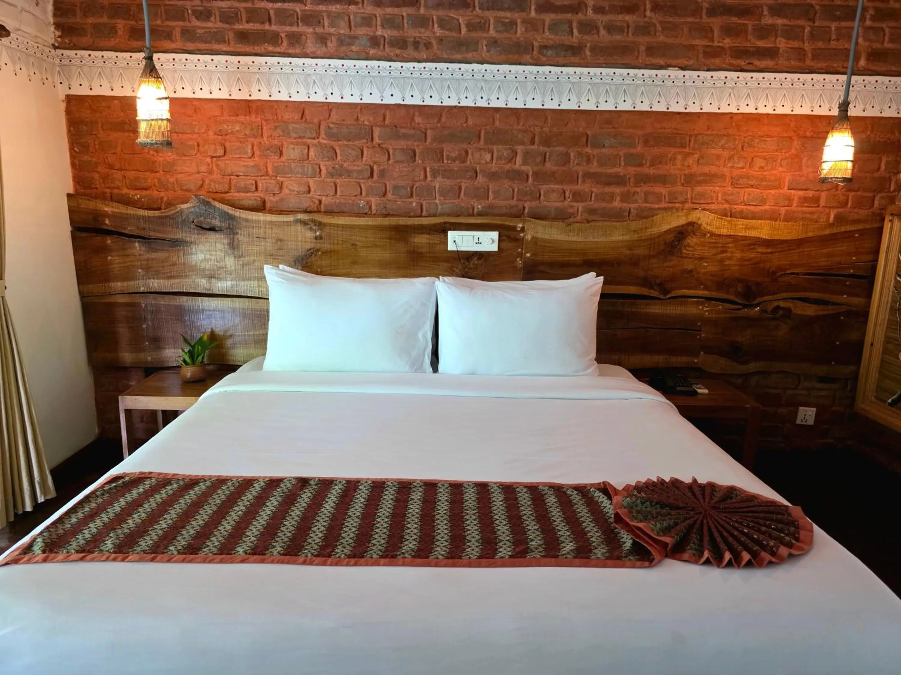 Bed in Siddhartha Wildlife Retreat