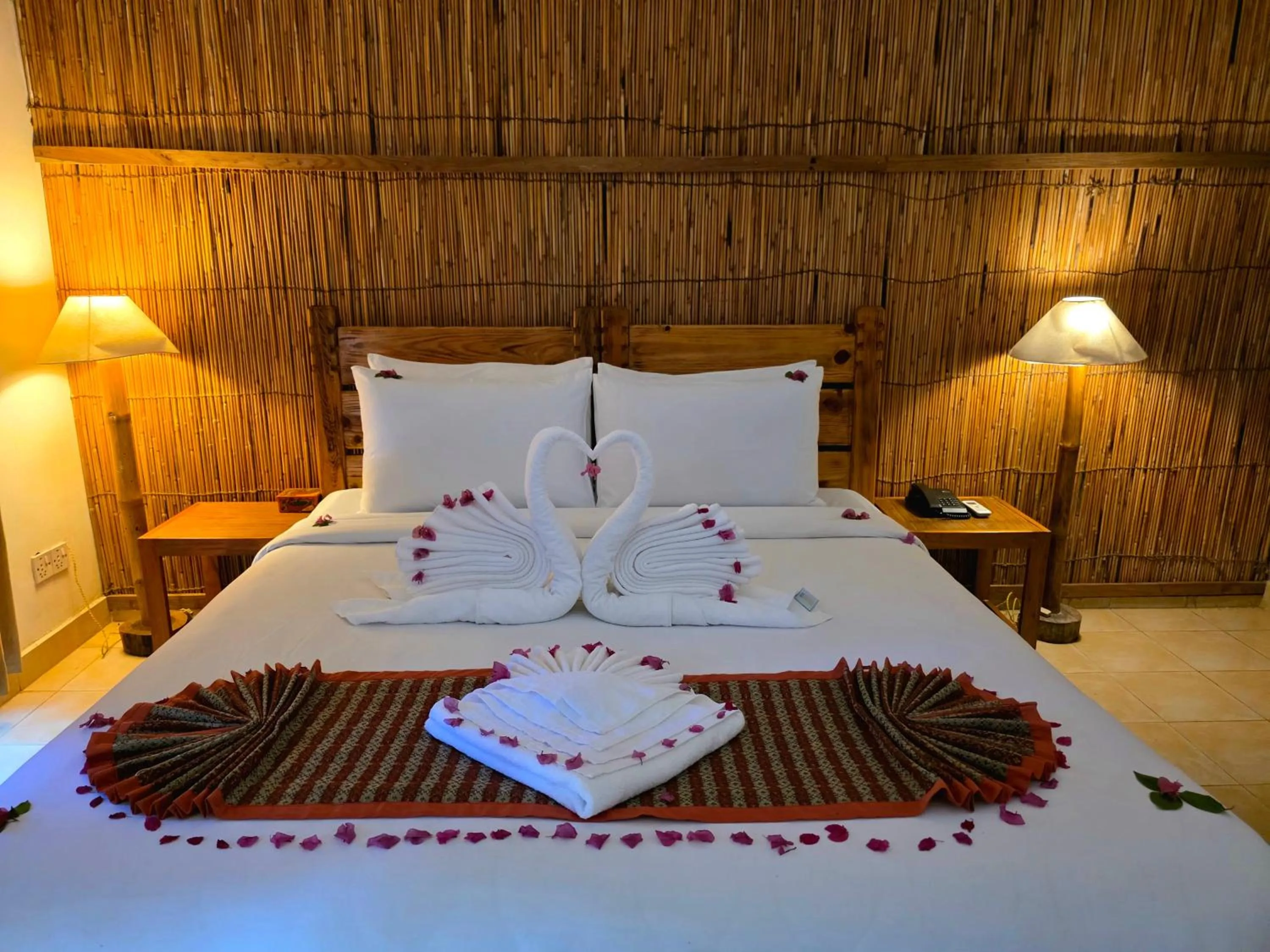 Bed in Siddhartha Wildlife Retreat