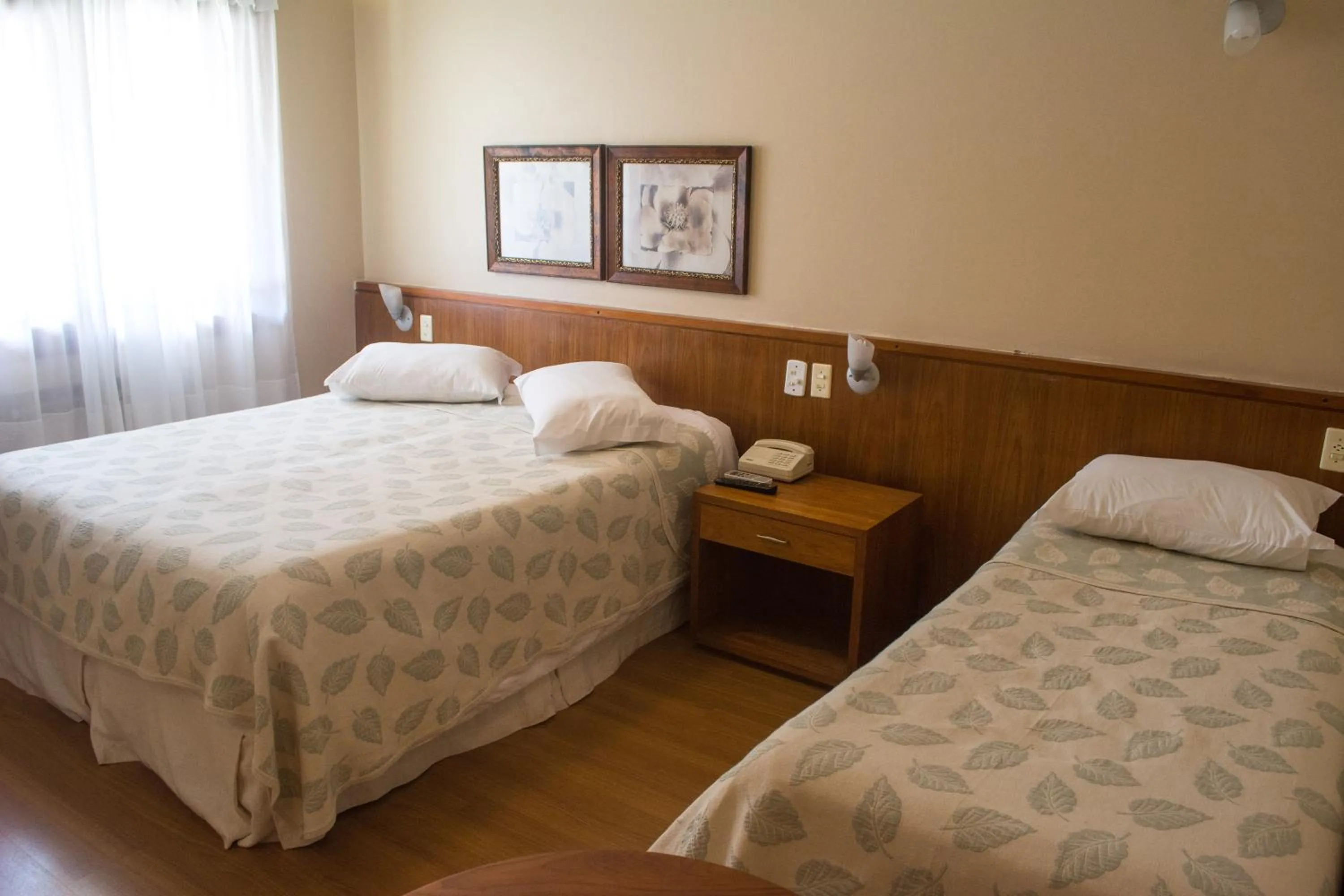 Photo of the whole room, Bed in Estalagem Vila Suzana - Quadra de Beach Tennis Indoor