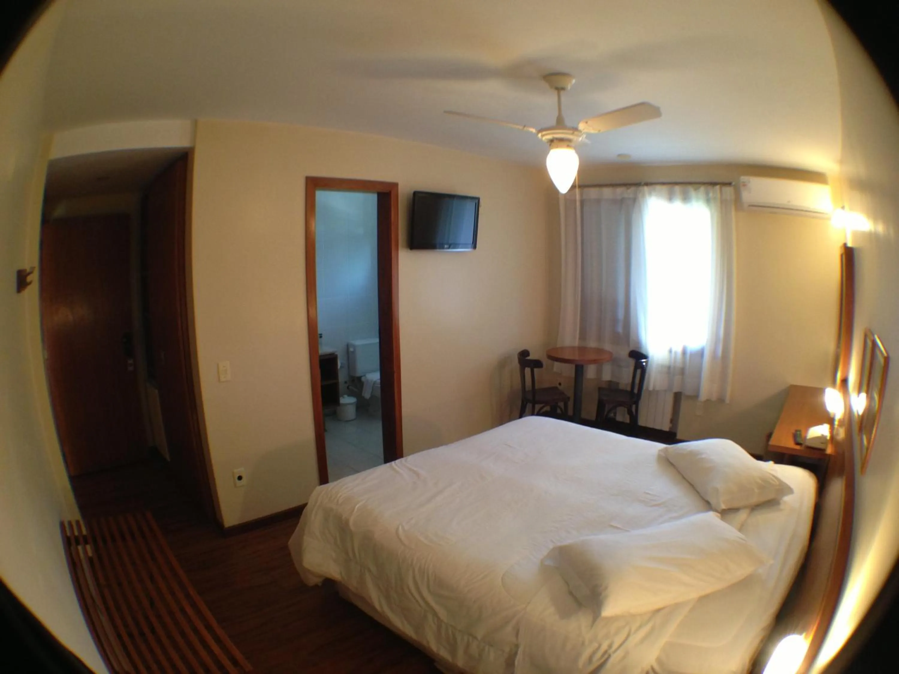 Photo of the whole room, Bed in Estalagem Vila Suzana - Quadra de Beach Tennis Indoor
