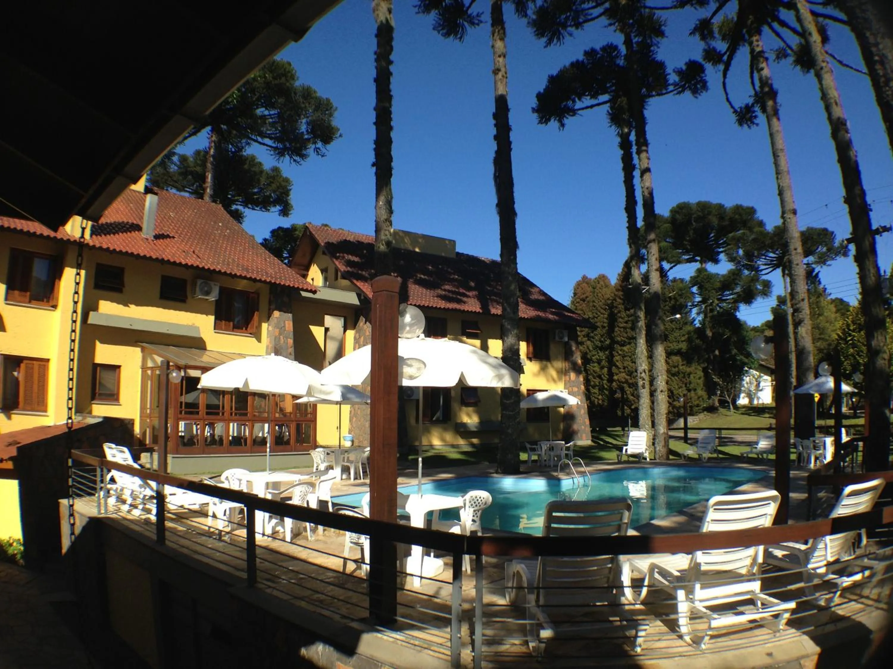 Pool view in Estalagem Vila Suzana - Quadra de Beach Tennis Indoor