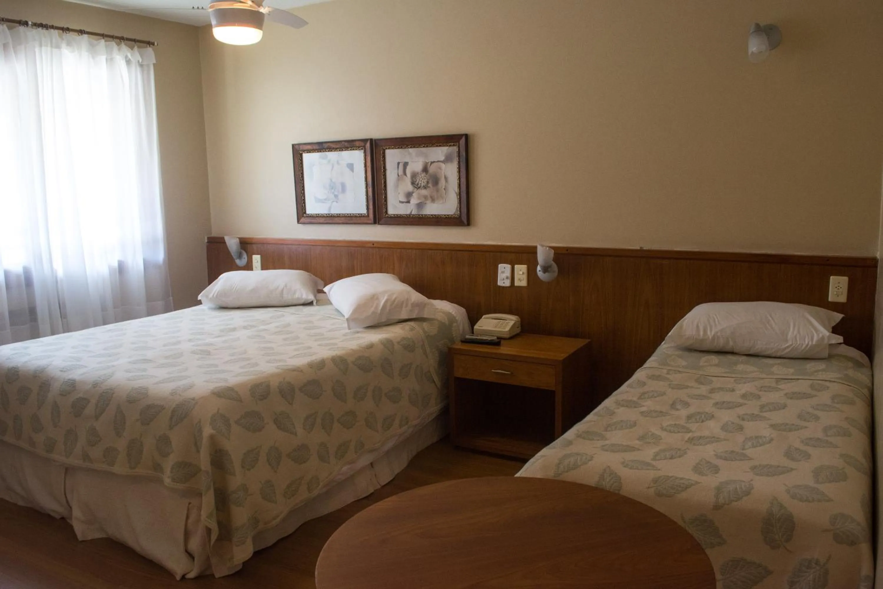Photo of the whole room, Bed in Estalagem Vila Suzana - Quadra de Beach Tennis Indoor