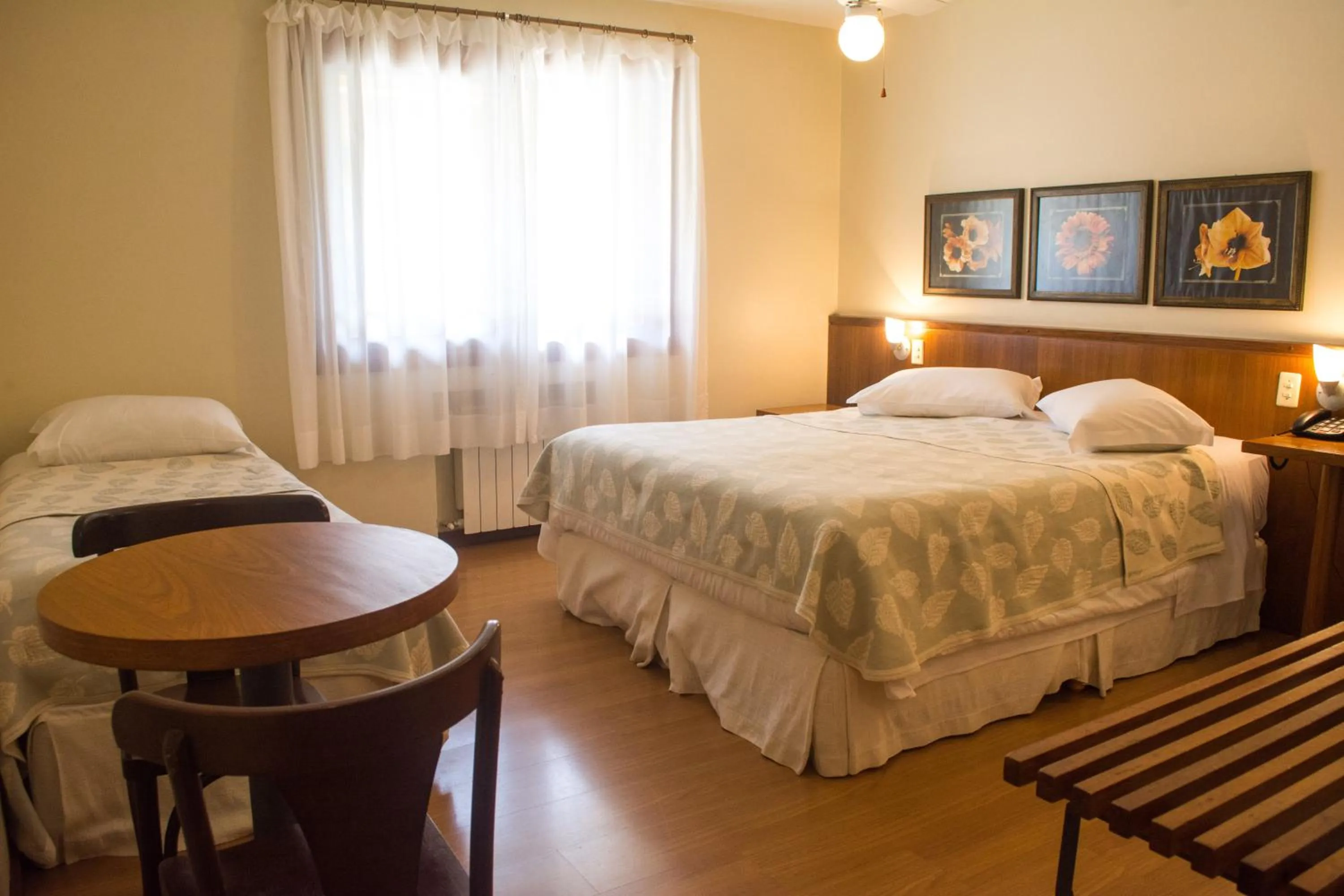 Photo of the whole room, Bed in Estalagem Vila Suzana - Quadra de Beach Tennis Indoor